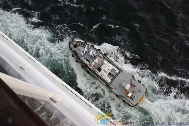 A ship pulled alongside to exchange ship pilots.