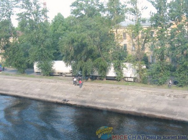 Body on embankment near the water