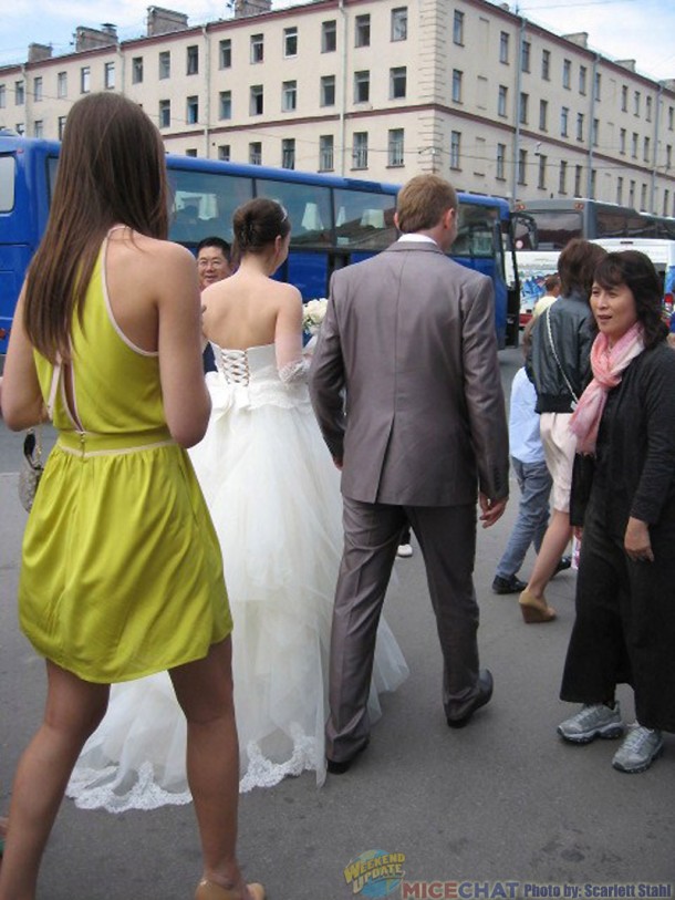 Wedding party and their bus