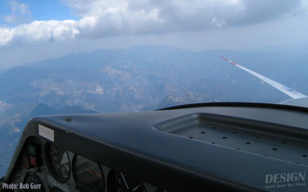 Soaring view over the mountains with the propellor stopped