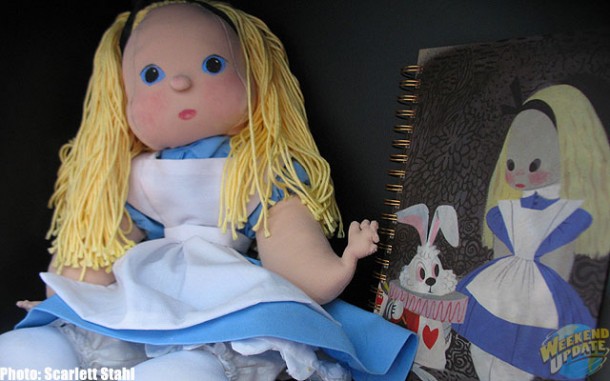 Alice doll and notebook in Maggie's bookcase