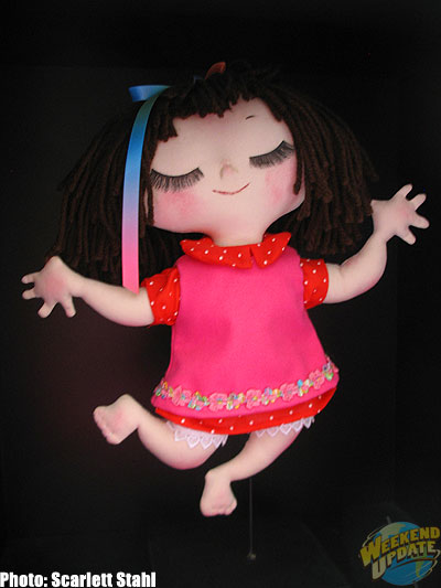 Maggie's Mary Blair doll in bookcase