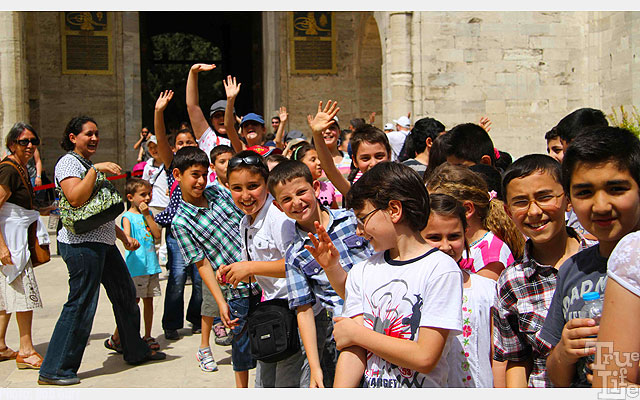 Friendly school children greet visitors to Turkey warmly