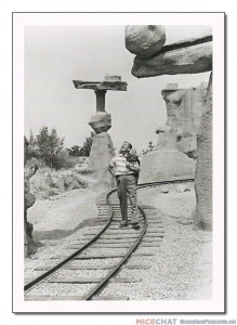 "The Rainbow Caverns Mine Train was one of Walt Disney's favorite attractions in Frontierland. Here he surveys his version of the Painted Desert in 1957."