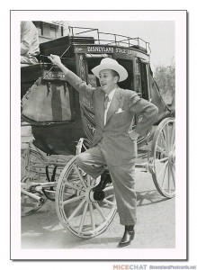 "The stage coach for Disneyland was built at the Walt Disney Studio in Burbank, California, and here Walt Disney takes it for a spin around the Studio lot to the surprise and amusement of his staff. A stage coach ride would be one of the highlights of Frontierland, where it remained for four years."