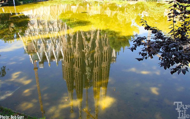 Barcelona's premier cathedral La Sagrada Familia in pond reflection