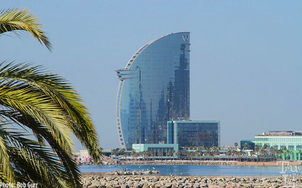 The sail-like W Hotel overlooks the Maremagnum Beach 