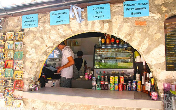 After hiking the steep steps to the village heights, a libation stop