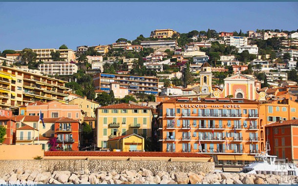 The hillside is home to many colorful riviera style villas