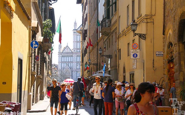 Basilica Santa Croce seen from a typical narrow street in historic