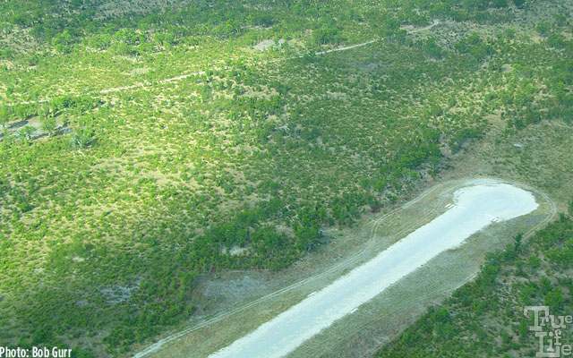 Camps have hard dirt runways placed several miles distant from camps