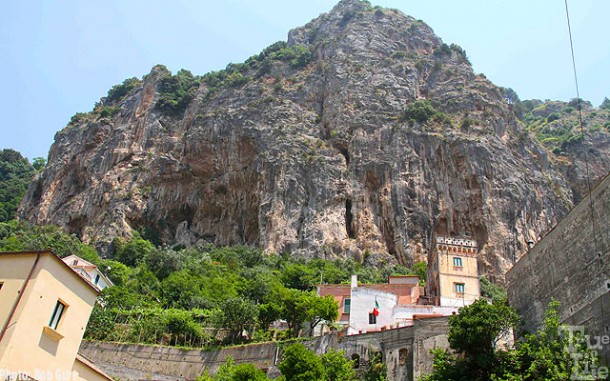 Towering rocks shelter village homes in Amalfi.