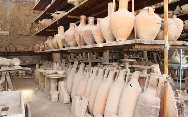 A warehouse of commercial clay food and wine storage flasks.