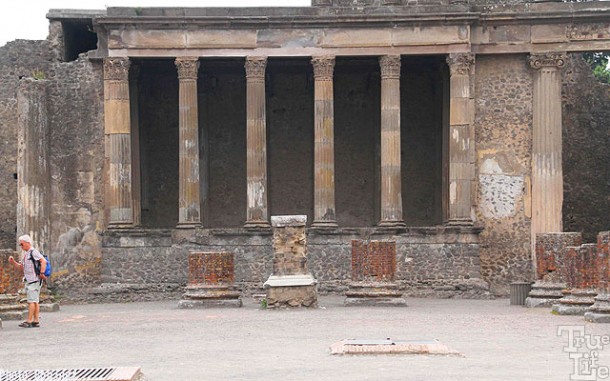 The Forum Temple's main stage framed by more columns.