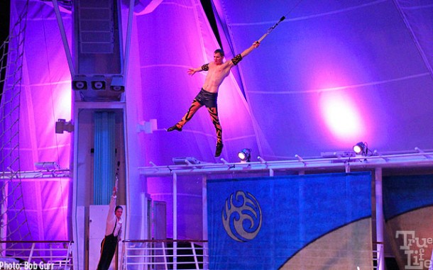 Aerialists perform with high wire acts on a moving ship at sea - amazing!