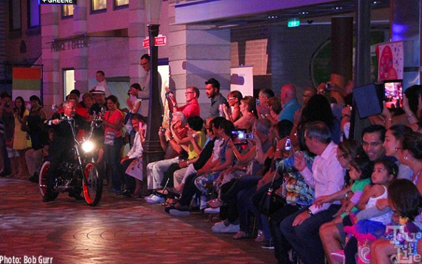 Captain Johnny rides one of his motorcycles to lead the parade - Captain Fun.