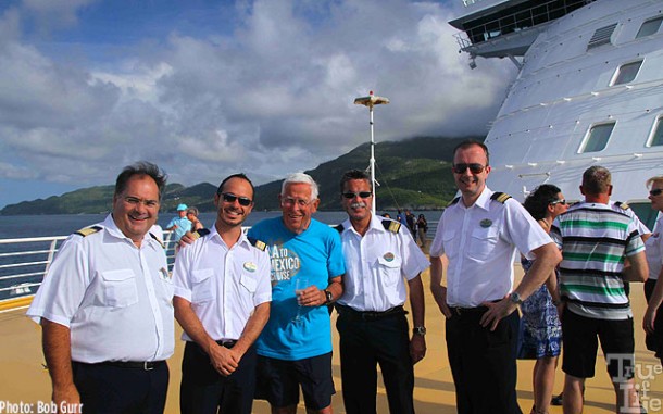 Bob enjoys the champagne party with some of the ships officers.