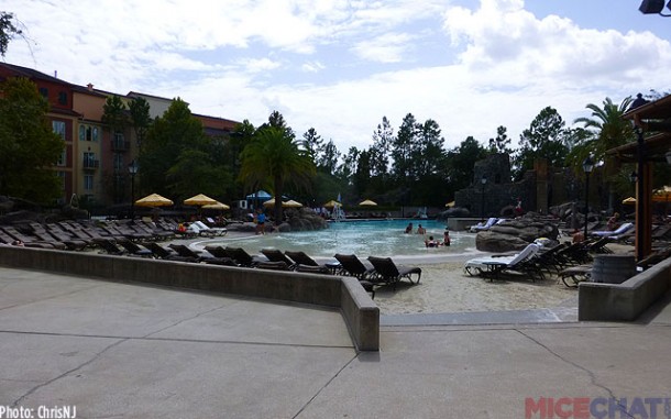 The Beach Pool has a zero entry area, lounge chairs in sand and a DJ
