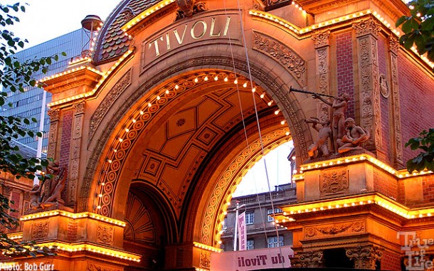 Main entrance to the historic Tivoli Gardens with beautiful night lighting