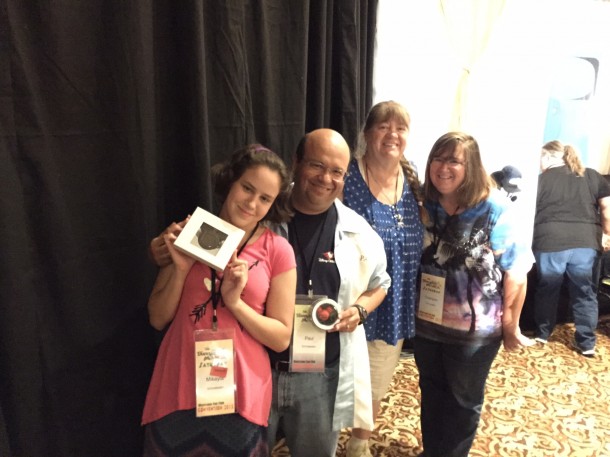 The Schnebelen family shows off their Disney prizes