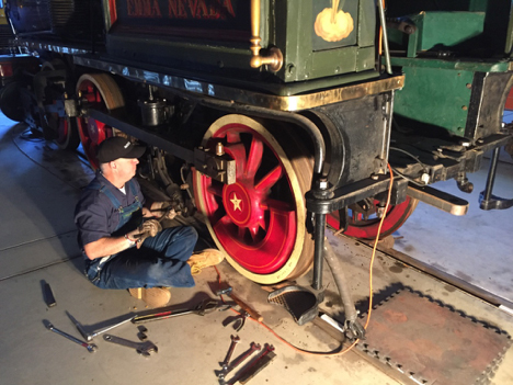 Ken Mitchroney starting to take off the side rods of the Emma Nevada.