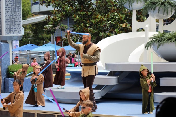 Younglings learn to use a lightsaber.