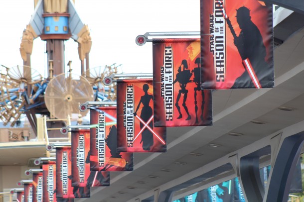 The banners on the opposite side show characters on the Dark Side.