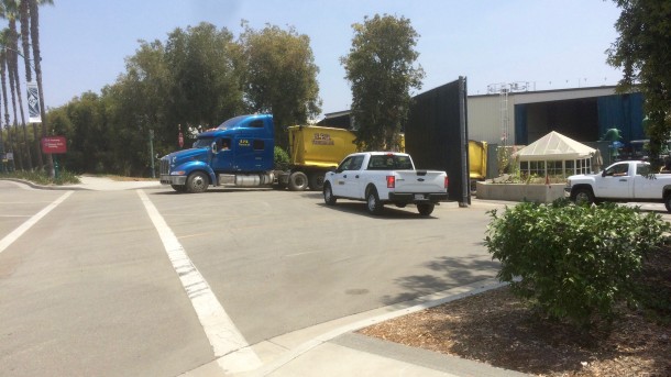 Steady streams of trucks are removing the debris from backstage.