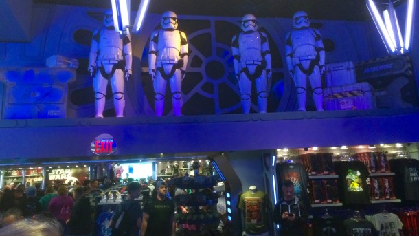 A group of First Order Troops watches over the lines in the Starcade.