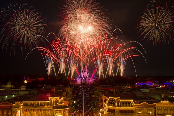 A red, white and blue fireworks spectacular illuminates the sky over Cinderella Castle at Magic Kingdom in Lake Buena Vista, Fla. Spectacular fireworks displays with brilliant bursts of light coloring the night sky above the theme parks have been a Walt Disney World Resort entertainment specialty for decades. Magic Kingdom honors America each year with a Fourth of July celebration on July 3 and 4 with &Ograve;Disney&Otilde;s Celebrate America! A Fourth of July Concert in the Sky,&Oacute; which features dazzling comets and glittery bursts soaring to a&Ecirc; musical score produced in a concert band style.&Ecirc; (David Roark, photographer)
