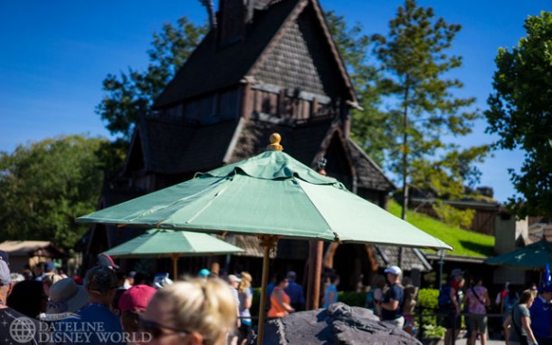 Disney has placed umbrellas outdoors to help with the summer heat.