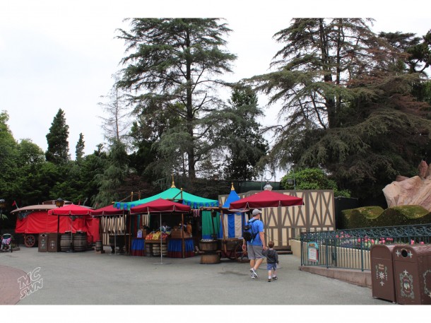 Green fencing gave way to more permanent wood walls around the site.