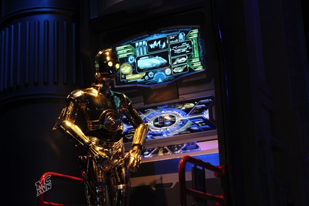 C-3P0 welcomes passengers on Star Tours. 