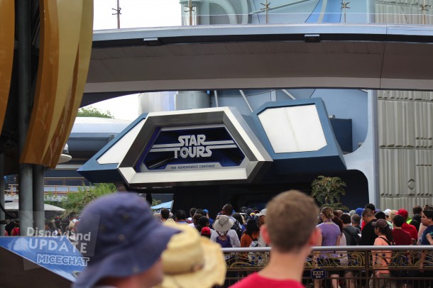 The opening crowd heads into Tomorrowland…