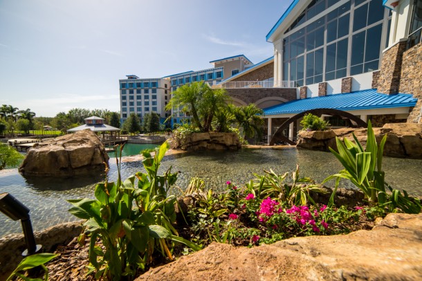 The falls lead downward to the water taxi area, giving the hotel a sense of elevation.