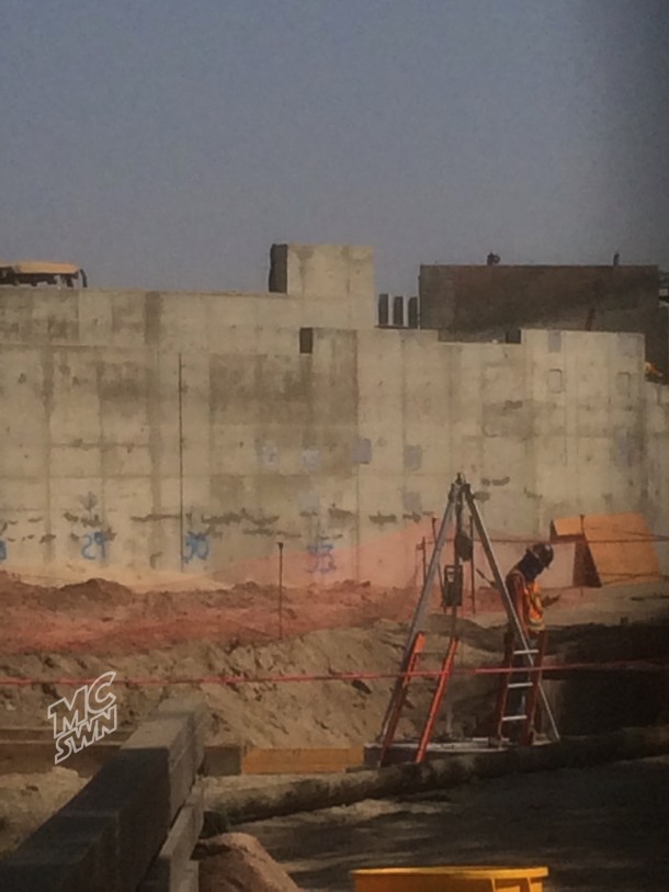 Through a knot hole, we see where Big Thunder Ranch used to be.