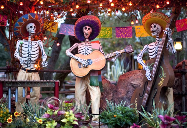 DIA DE LOS MUERTOS (ANAHEIM, Calif.) A colorful display at Disneyland park honors Dia de los Muertos with cheerful skeletons, sugar skulls and marigolds during Halloween Time at the Disneyland Resort, from Sept. 9 through Oct. 31 2016. The Halloween season features seasonal entertainment and décor, in addition to the return of Haunted Mansion Holiday and Space Mountain Ghost Galaxy. This year, the family-friendly Mickeys Halloween Party will be held on 17 nights at Disneyland Park, where guests are invited to trick-or-treat in costume, celebrate with favorite Disney characters and enjoy the Halloween Screams fireworks spectacular. (Paul Hiffmeyer/Disneyland Resort)