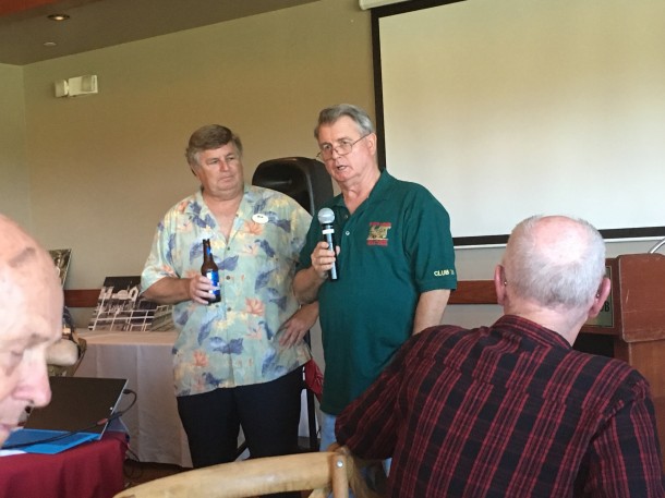 Mine Train veteran Scott Fleener listens intently as his former boss, John McCoy, recounts the tale of the night a Jungle Cruise pistol went missing.