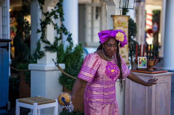 At the American Adventure pavilion, there is a Kwanzaa storyteller.