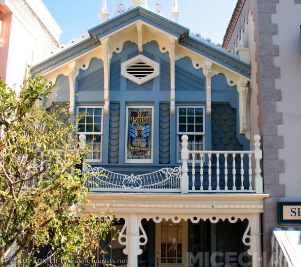 Rolly's Main Street window holds an honored place above what is now widely known as "Rolly's Porch." The window is full of references to Rolly's important contributions to Disneyland.