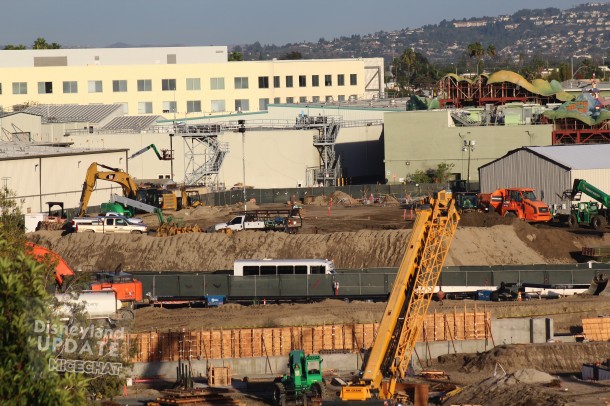 What used to be a four-story mountain of dirt has filled in new berms in the area and is almost gone. This will eventually be the site of the Millennium Falcon attraction.