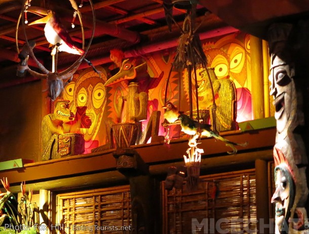 The Tiki Drummers of the Enchanted Tiki Room. Their arms are flying and their eyes are flashing as the room comes alive with a Pacific Islands celebration.