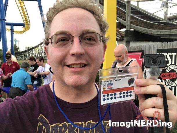 George Taylor from ImagiNERDing holding his 10k lanyard for the ACE Fun Spot Coaster Marathon