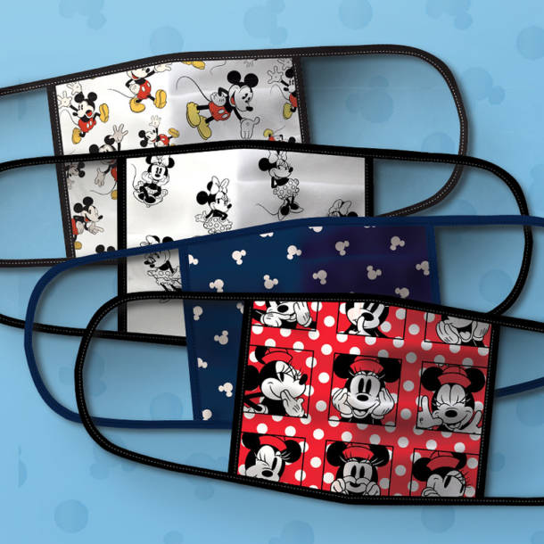 a set of reusable, cloth face masks with Mickey and Minnie Mouse designs on them, sold at shopDisney