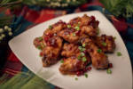 Scrooge’s Spicy CranberryPomegranate Glazed Wings