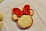 Disney Minnie Polka Dot Cookies Donna red minnie being iced