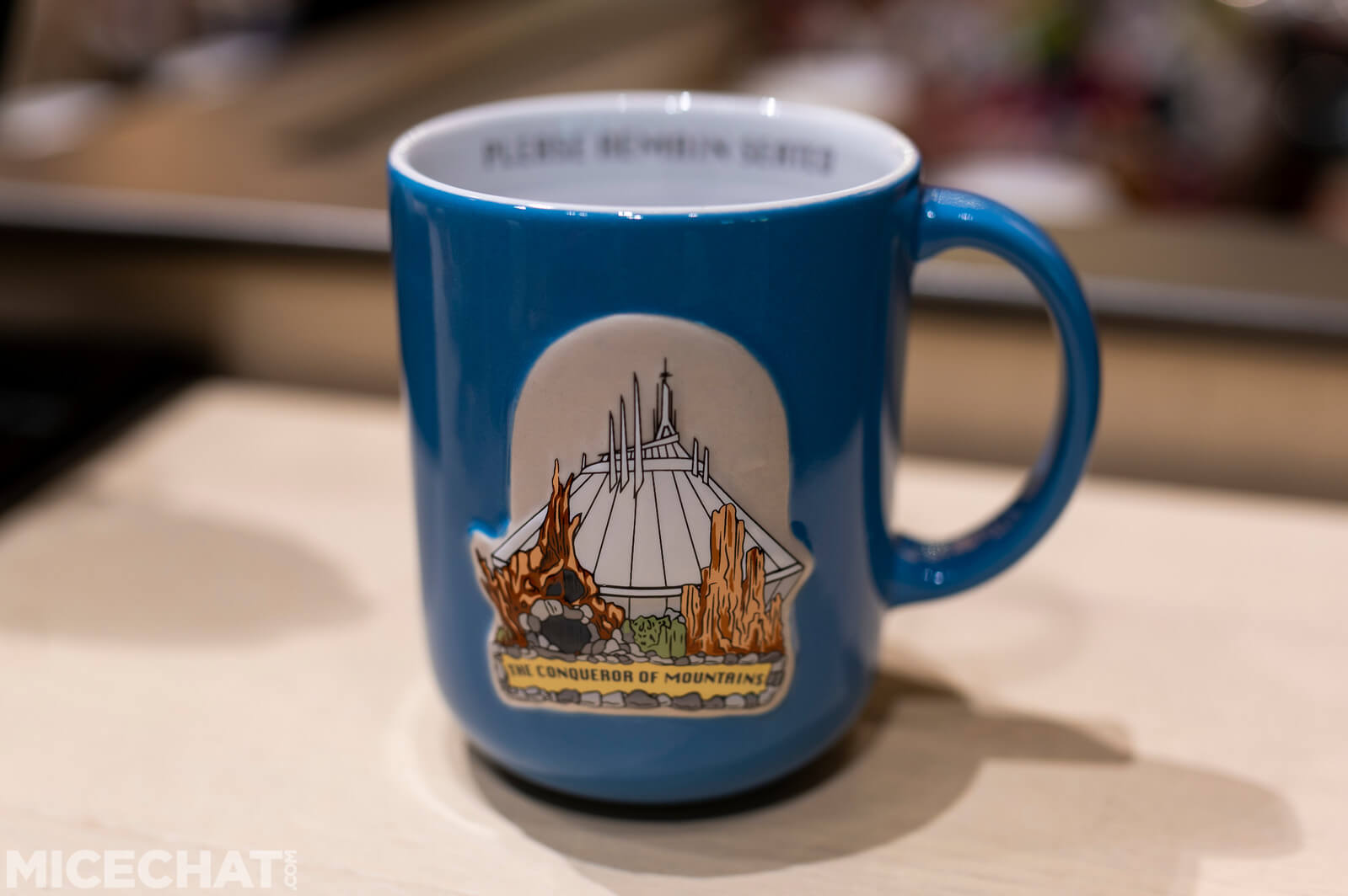 A mug featuring Big Thunder Mountain, Space Mountain, and Splash Mountain