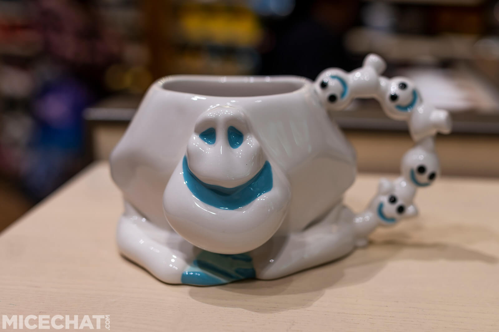 A mug shaped like Marshmallow from Frozen