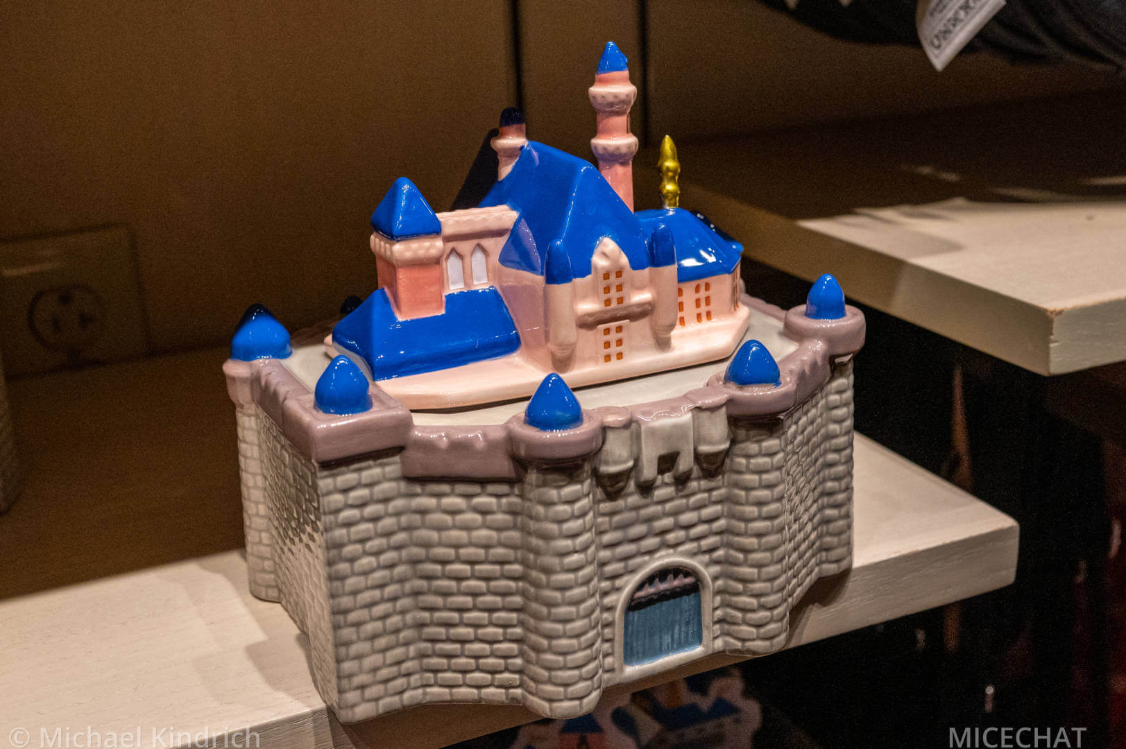 A cookie jar shaped like Sleeping Beauty Castle