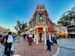 Disneyland crowds shopping main street evening
